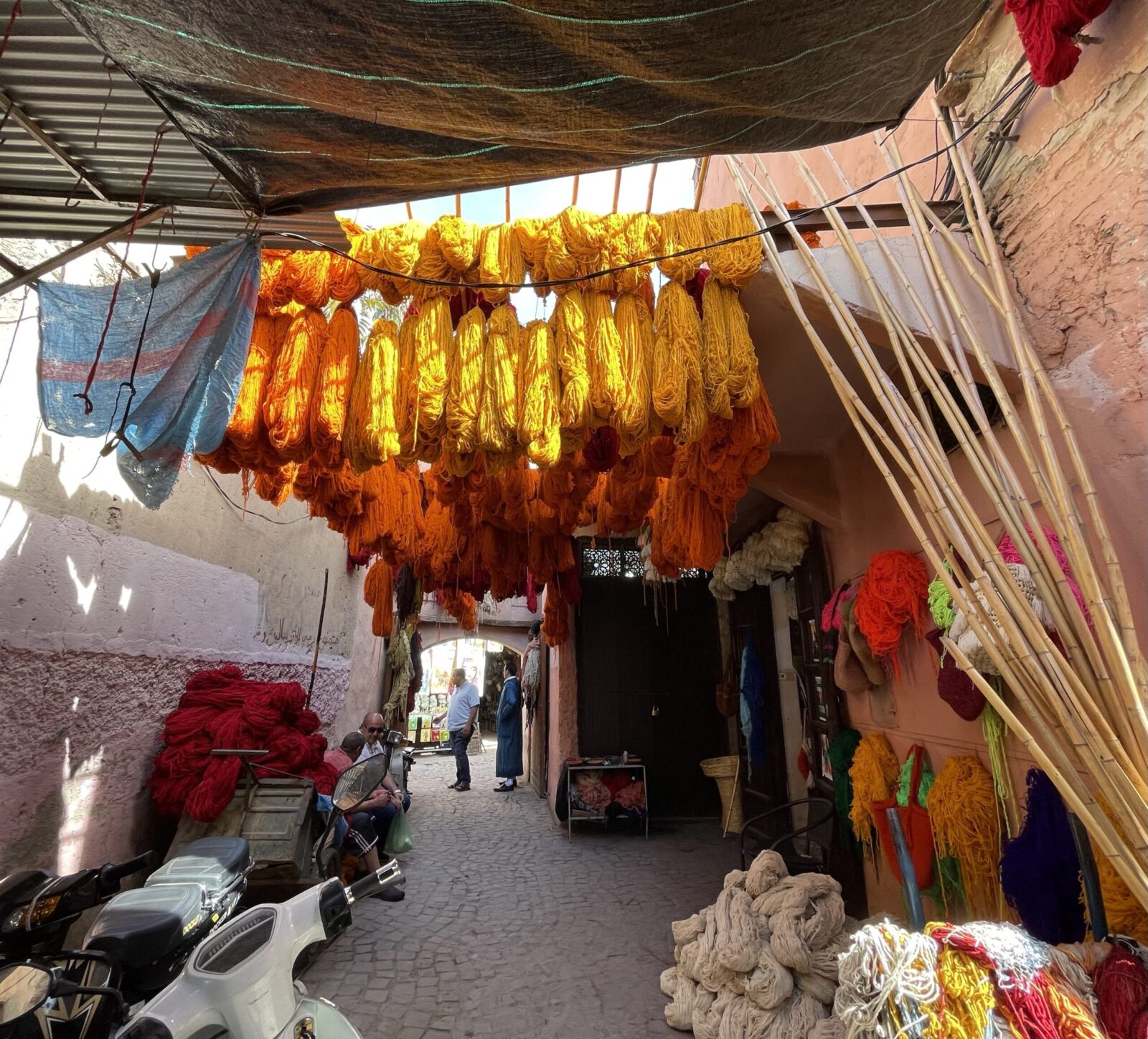 Yellow and red yarns drying in the sun in Marrakech