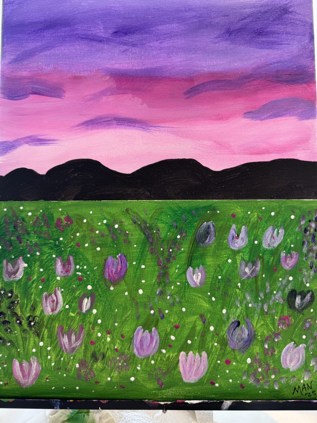 painting with flowers in foreground, purple sky
