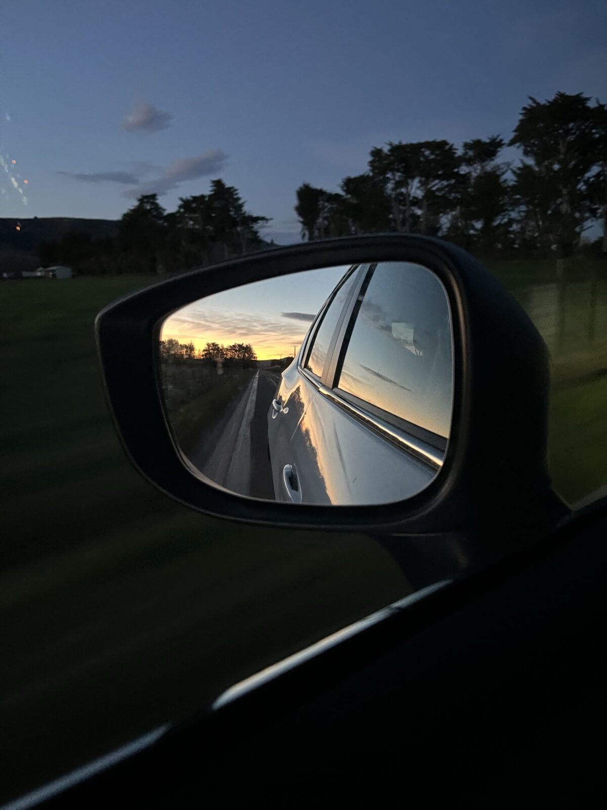 reflection through a car mirror
