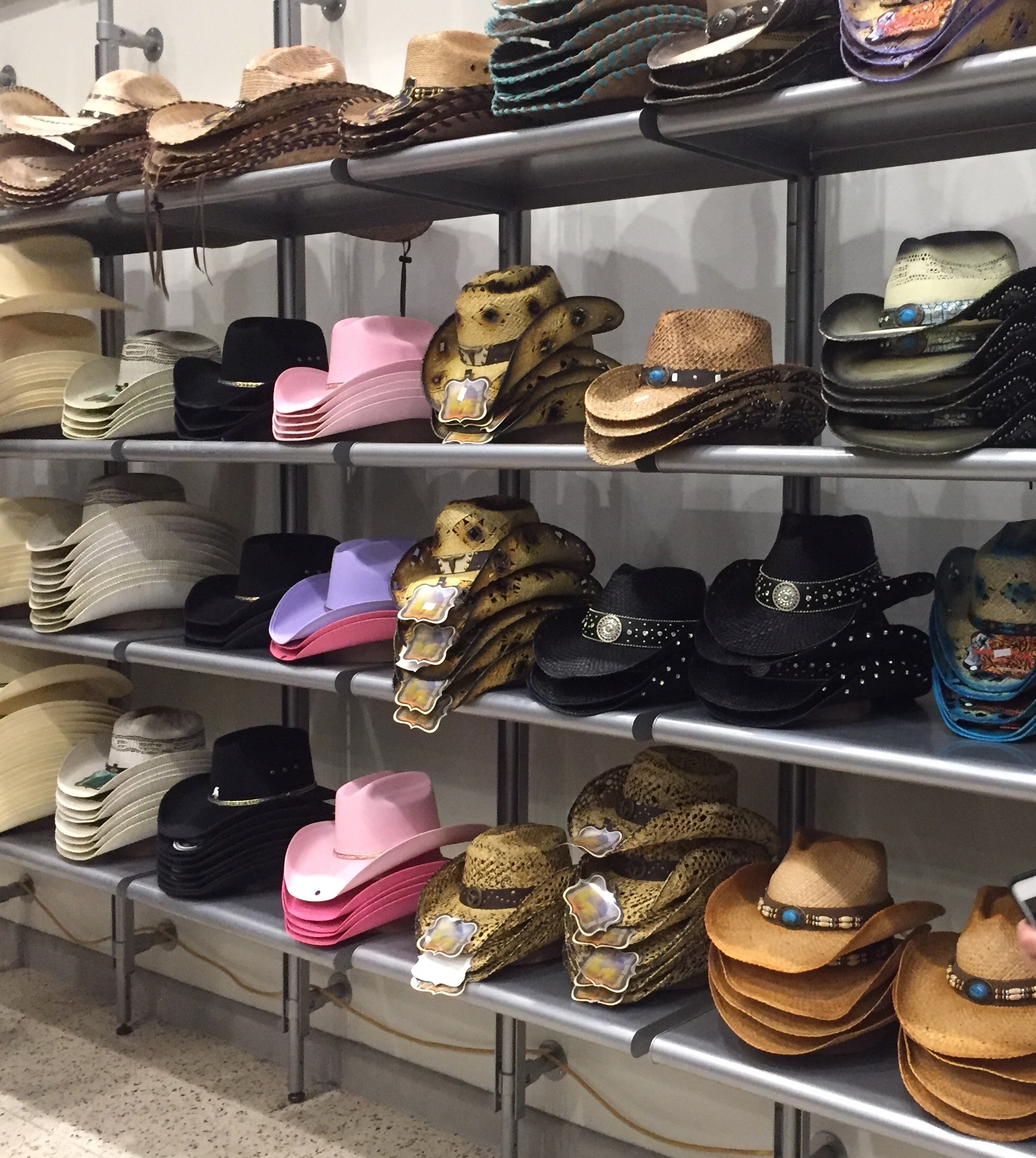 Cowboy hats on racks